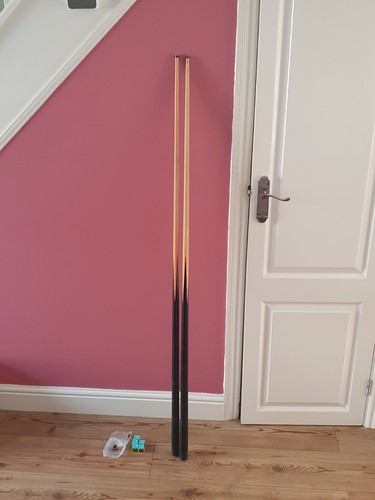 Two pool cues - two, spare